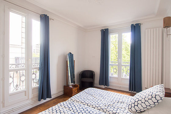 Bedroom with double-glazed windows facing the road