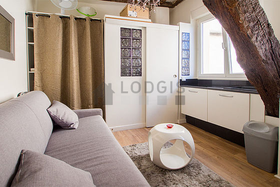 Quiet living room furnished with 1 bunk bed(s) of 90cm, tv, 2 armchair(s)