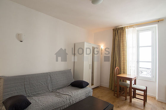 Quiet living room furnished with 1 sofabed(s) of 140cm, tv, closet