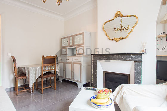 Living room with double-glazed windows facing the road