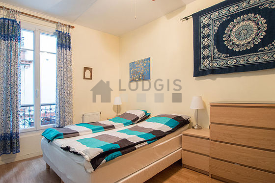 Bedroom with wooden floor