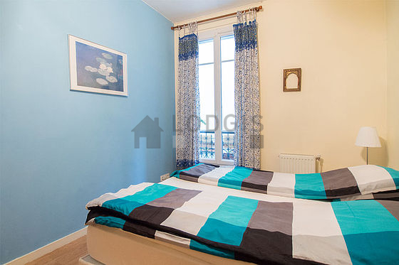 Bedroom with double-glazed windows facing the courtyard