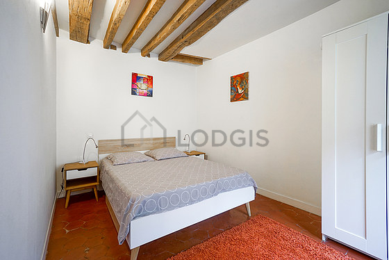 Bedroom with floor tiles floor
