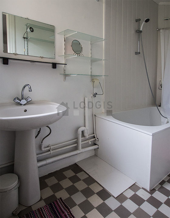 Bright bathroom with wooden floor