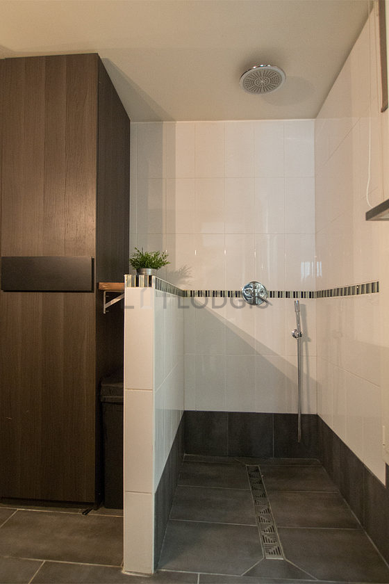 Beautiful bathroom with double-glazed windows and with tile floor