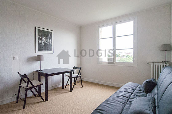 Quiet living room furnished with 1 sofabed(s) of 140cm, tv, storage space, 2 chair(s)