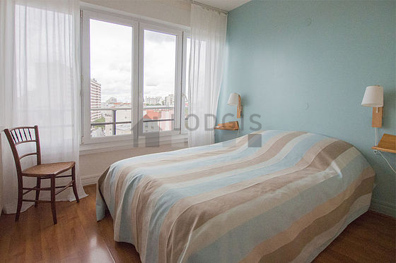 Bedroom with wooden floor