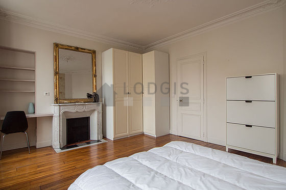 Bright bedroom equipped with desk, wardrobe, cupboard, 1 chair(s)
