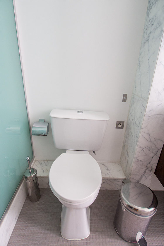 Bathroom equipped with bath tub, separate shower, towel drying radiator