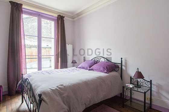 Bedroom with windows facing the courtyard