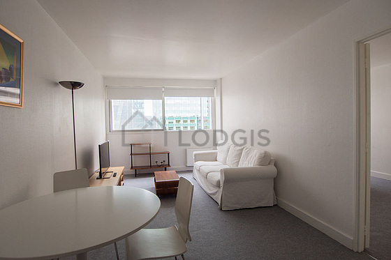 Quiet living room furnished with 1 sofabed(s) of 140cm, tv, 3 chair(s)