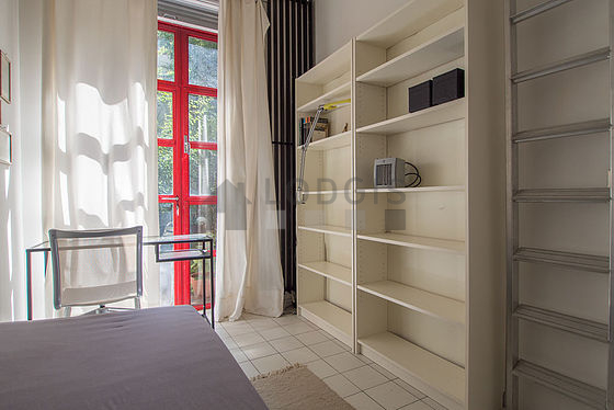 Bedroom with windows facing the garden