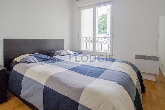Bedroom with wooden floor
