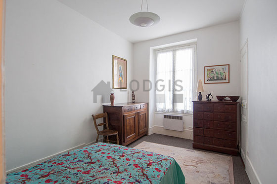 Bedroom with the carpeting floor