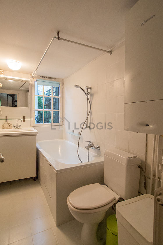 Bathroom with tile floor