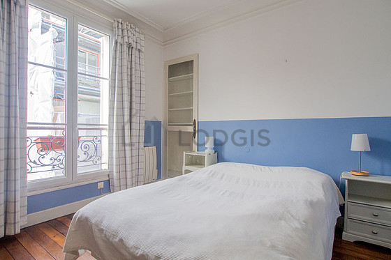 Bedroom with wooden floor