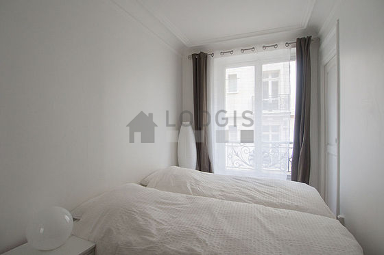 Bedroom with wooden floor