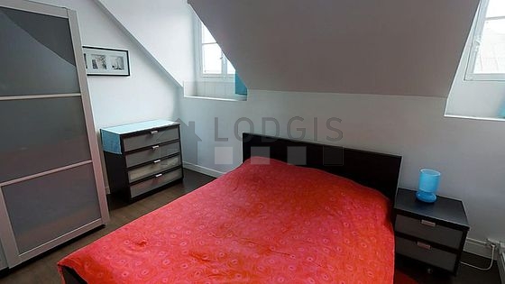 Bedroom with tile floor