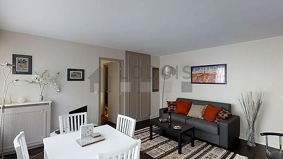 Quiet living room furnished with 1 sofabed(s) of 140cm, tv, 4 chair(s)