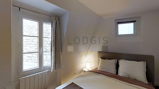 Chambre de 10m² avec du parquet au sol