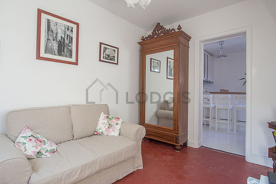 Very quiet living room furnished with 1 sofabed(s) of 0cm, tv, closet, cupboard