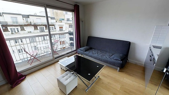 Quiet living room furnished with 1 sofabed(s) of 160cm, tv, cupboard, 2 chair(s)