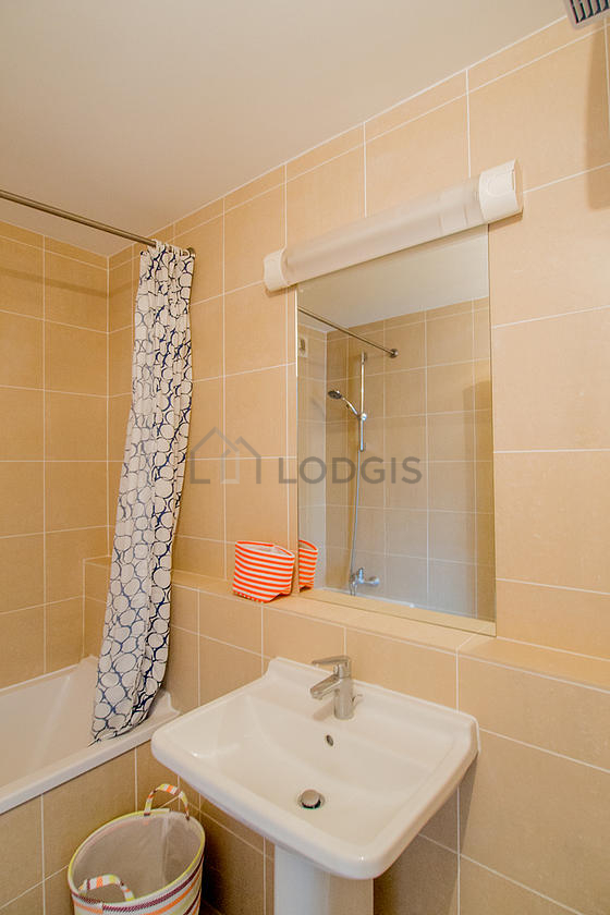 Pleasant bathroom with tile floor