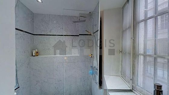 Pleasant bathroom with tile floor