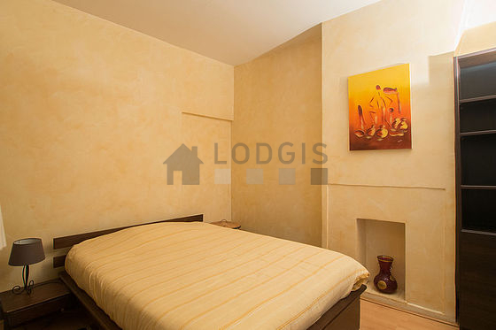Bedroom equipped with desk, wardrobe, cupboard, bedside table
