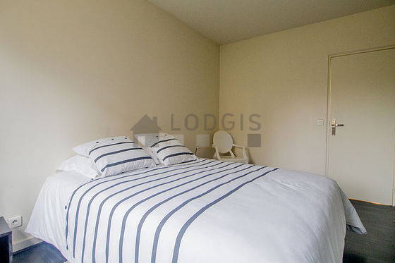 Bedroom with wooden floor