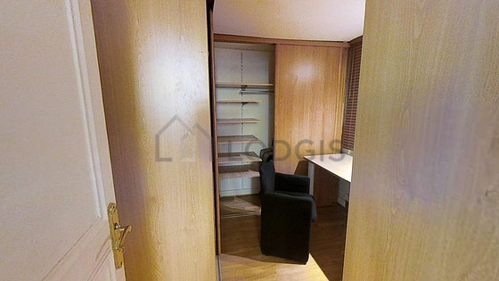 Beautiful dressing-room serviced with : wardrobe, cupboard, 3 chair(s)