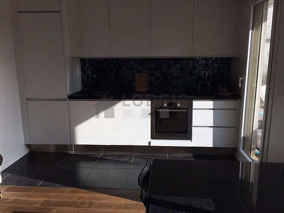 Bright kitchen facing the road