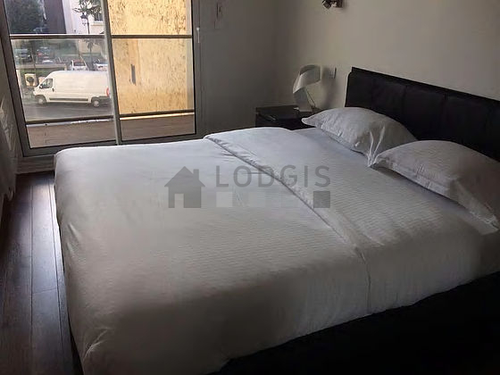 Chambre de 10m² avec du parquet au sol