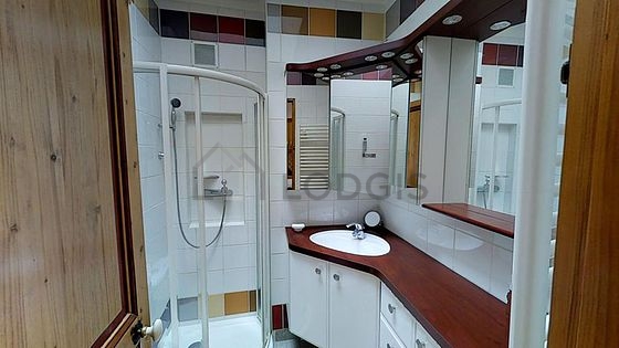 Pleasant and very bright bathroom with tile floor