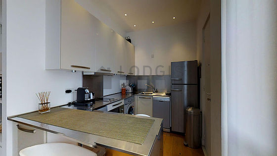 Kitchen where you can have dinner for 4 person(s) equipped with washing machine, dryer, refrigerator, extractor hood