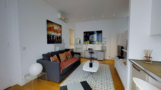 Salon de 19m² avec du parquet au sol