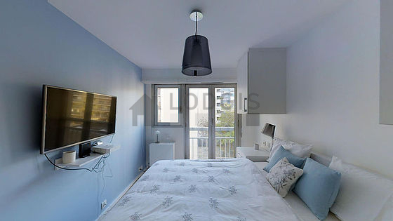 Bedroom with wooden floor