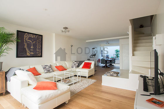 Very quiet living room furnished with tv, 6 chair(s)