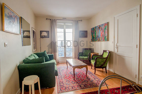 Very quiet living room furnished with sofa, 2 armchair(s), 4 chair(s)