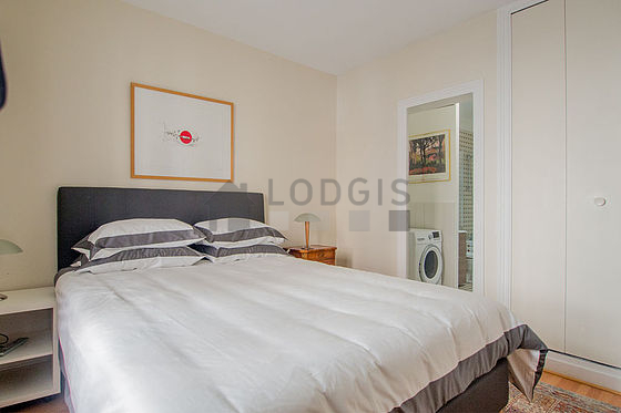 Chambre de 11m² avec du parquet au sol