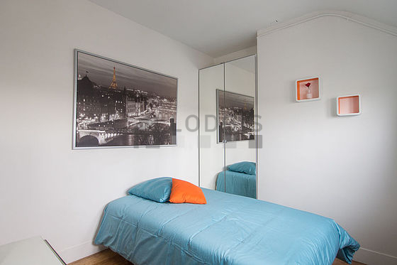 Very quiet living room furnished with 1 bed(s) of 80cm, tv, wardrobe, cupboard
