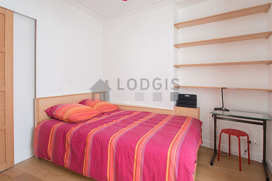 Bedroom with wooden floor