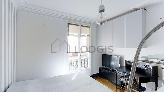 Chambre de 10m² avec du parquet au sol