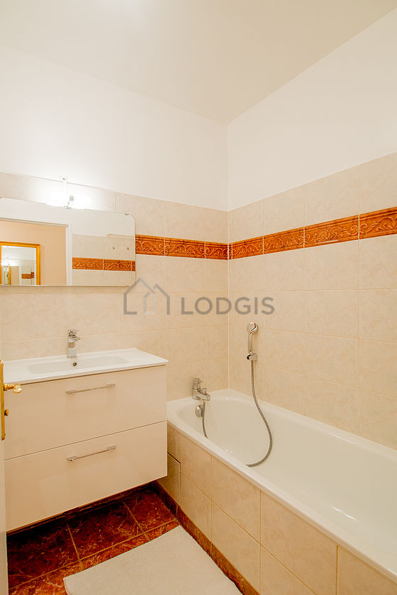 Pleasant and bright bathroom with tile floor