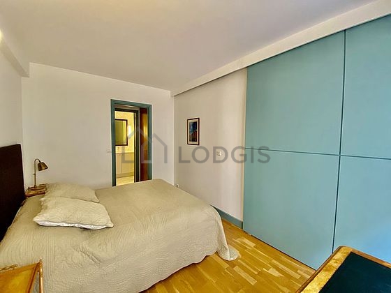 Bright bedroom equipped with desk, wardrobe, cupboard, 1 chair(s)