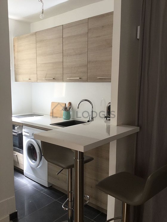 Great kitchenopens on the living room with tile floor