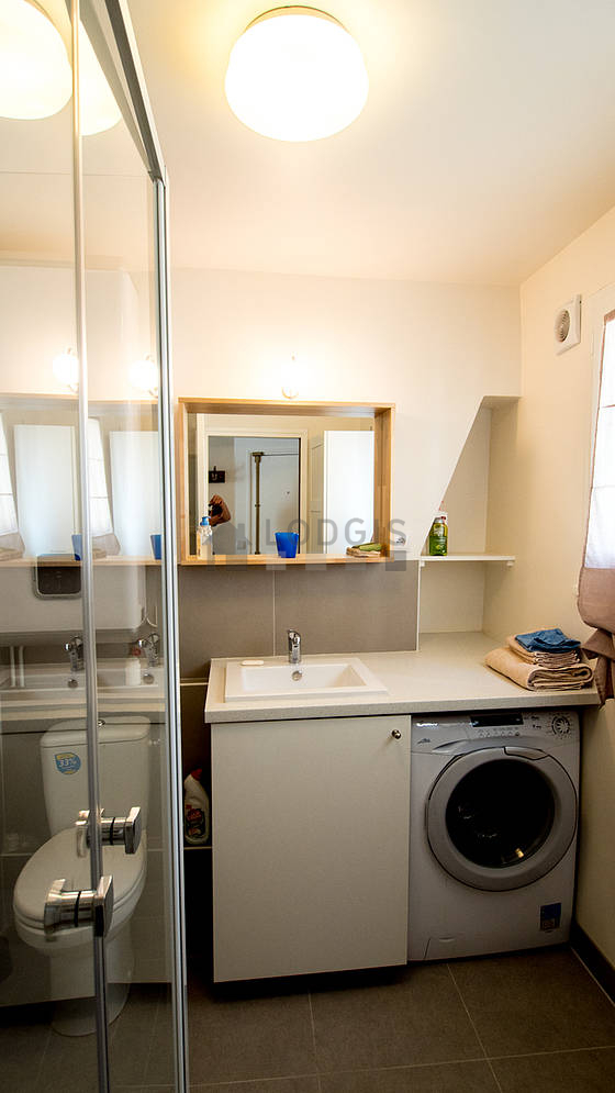 Pleasant and bright bathroom with tile floor