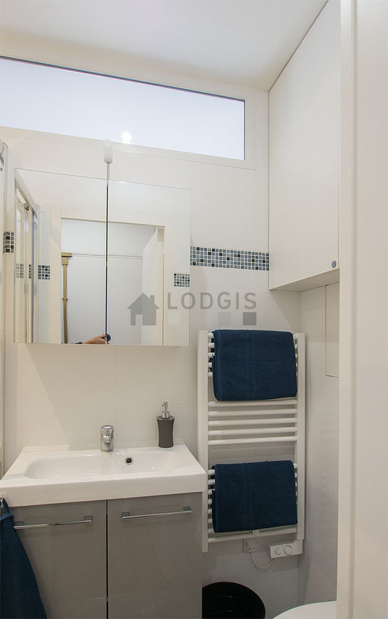 Pleasant and bright bathroom with tile floor