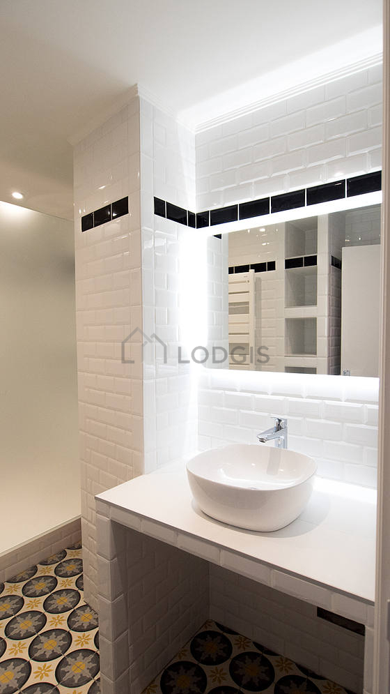 Pleasant bathroom with tile floor