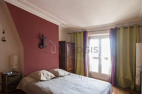 Bedroom with wooden floor